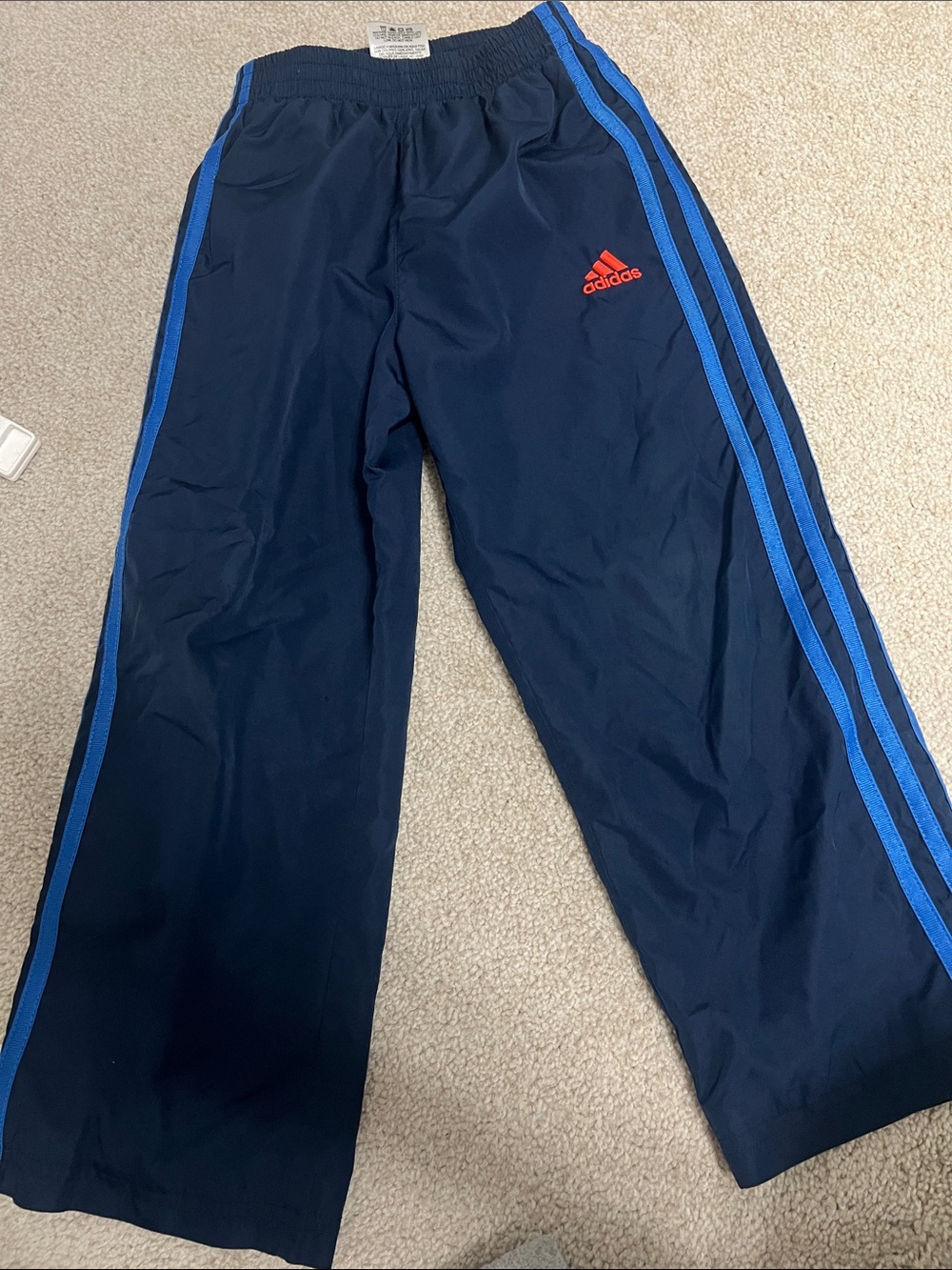 Adidas Navy lightweight trackpants with Light Blue Side Stripes and Red Logo